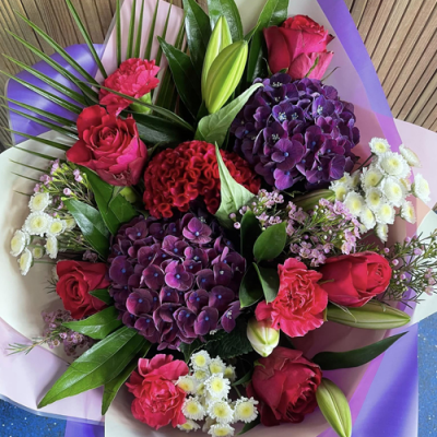 Sugar Plum - A magnificent handtied bouquet in water presented in a gift box/bag. Created using white and green flowers with complimentary foliage. Hand delivered with care in and around Newcastle by Fantasia Florist.