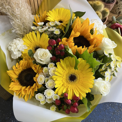 Rise & Shine - A delightful handtied bouquet in water presented in a gift box/bag. Created using sunflowers and white flowers with complimentary foliage. Hand delivered with care in and around Newcastle by Fantasia Florist.