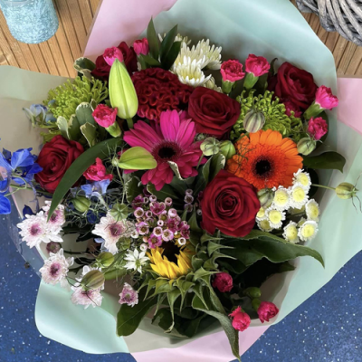 Fairy Garden - A beautiful handtied bouquet in water presented in a gift box/bag. Created using pink, red and white flowers with complimentary foliage. Hand delivered with care in and around Newcastle by Fantasia Florist.